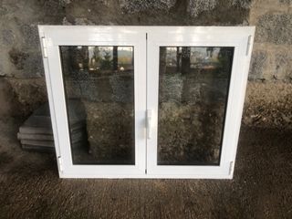 Ventana aluminio oscilobatiente, marco y reja