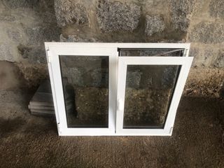 Ventana aluminio oscilobatiente, marco y reja