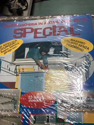 Tendedero inox pared