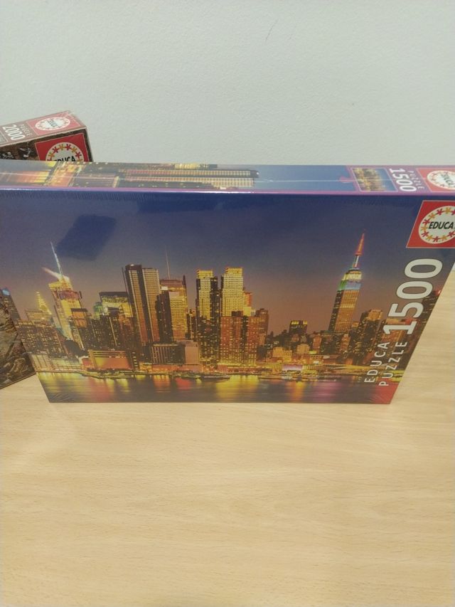 2 puzles,1500 piezas y 2000