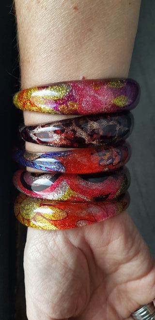 Set Braccialetti rigidi in resina colorata