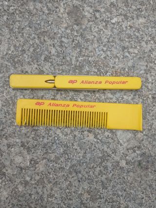Bolígrafo y peine alianza popular