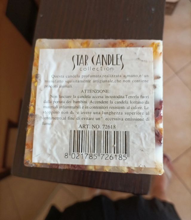 Candela artigianale con fiori secchi