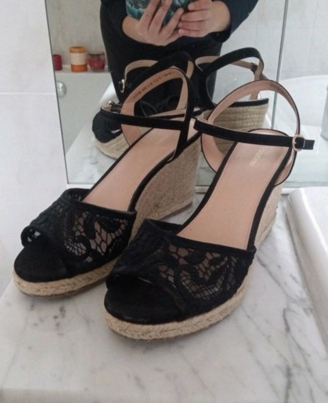 Scarpe nere zeppe e plateau