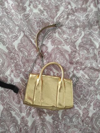 Bolso fiesta dorado zara