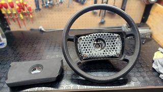 MB w116: Volante, espejo, cenicero...