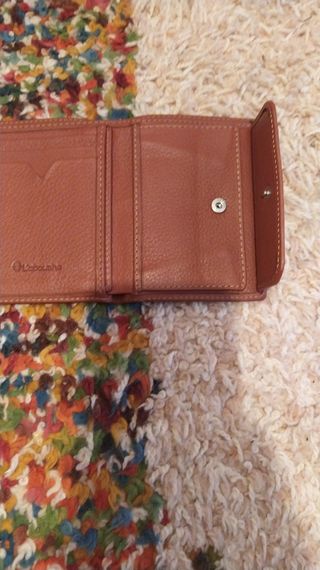 Cartera de cuero en color marrón