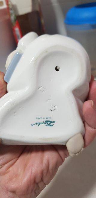 PORCELANA LLADRO NIÑO CON VELA IMPOLUTA