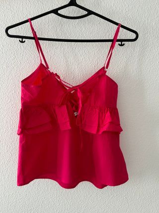 Preciosa camisa de tiranta en rosa fucsia. Talla M