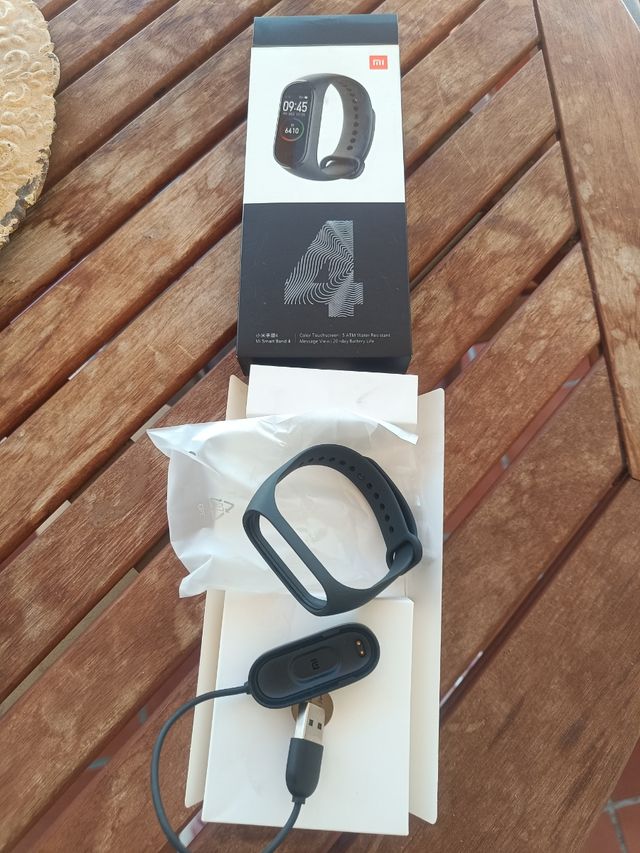 Cargador y pulsera original Xiaomi mi band 4