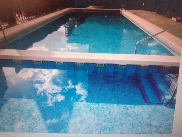 Benidorm 2 hab. con piscina y parking. Levante