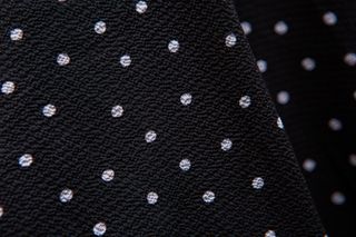 Mono de lunares en color negro de Women'secret