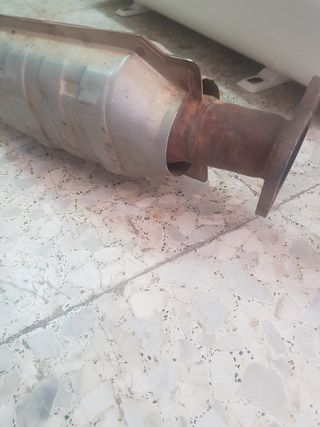 escape silenciador Ford escord