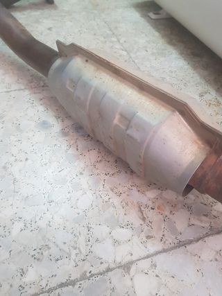 escape silenciador Ford escord