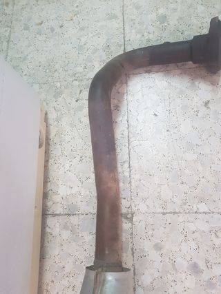 escape silenciador Ford escord