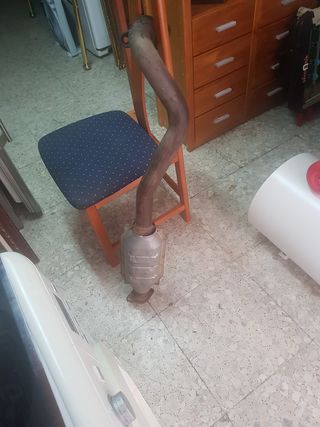 escape silenciador Ford escord