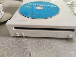 Nintendo Wii con accesorios. 