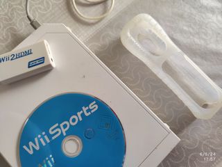 Nintendo Wii con accesorios. 