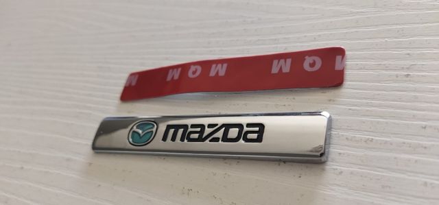 Insignia Mazda emblema 
