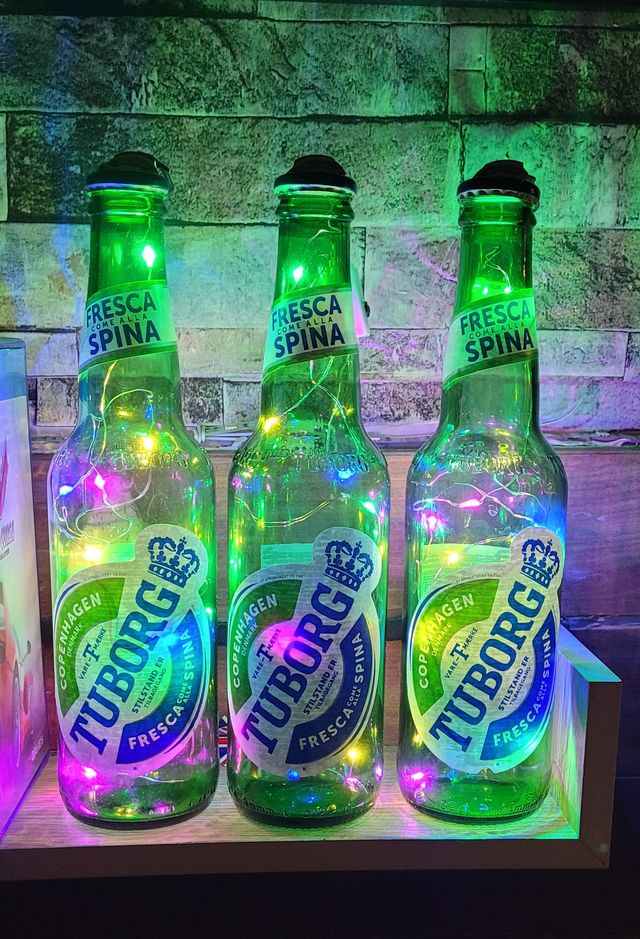 Bottiglie luminose decorative atmosfera