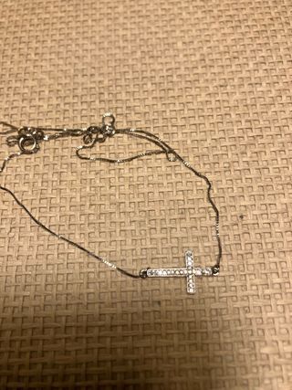 Cruz oro blanco y diamantes