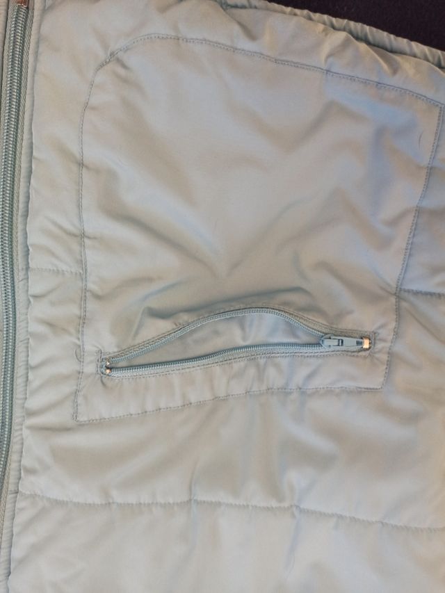 Gilet piumino celeste con cappuccio 