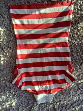 Polo  de manga  corta de rayas .