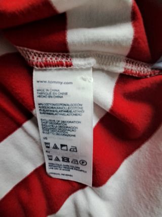 Polo  de manga  corta de rayas .