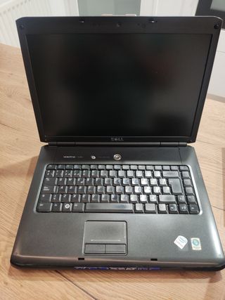 Portátil Dell Vostro 1500 y cargador uni