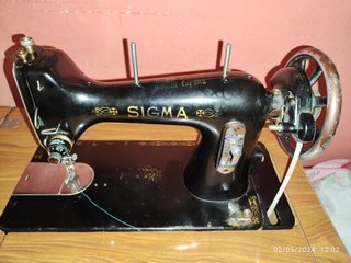 Maquina de coser Sigma antigua