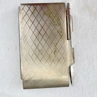 Antiguas libretas de metal y religiosa