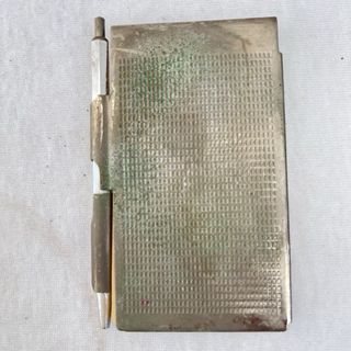 Antiguas libretas de metal y religiosa