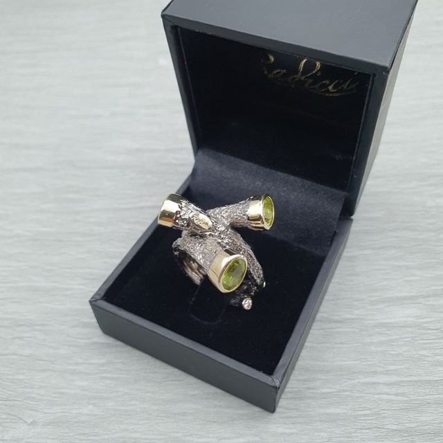 Anillo ajustable plata 925 peridotos y circonitas