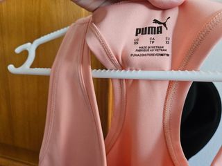 Camiseta rosa tirantes Puma, espalda nadadora