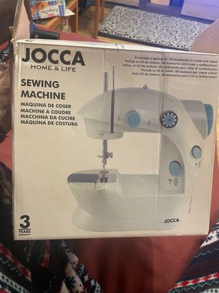 Maquina de coser viaje.