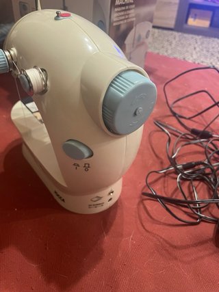 Maquina de coser viaje.