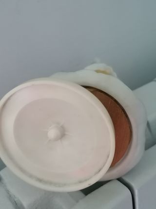 Statuina in ceramica con carillon