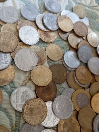 Monete peseta e altro