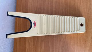 Leva stivali con raschietto