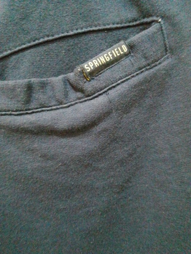 Pantalón corto deportivo de hombre azul.