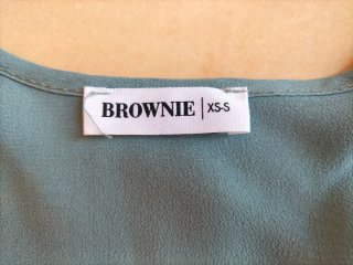 Blusa fluida Brownie turquesa.