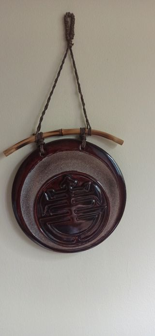 Decorazione da parete con simbolo asiatico