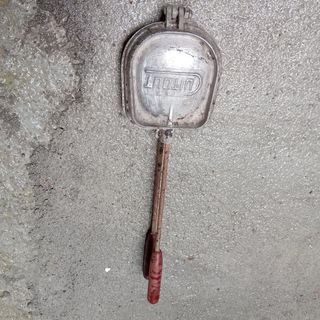 Cocina utensilios antiguos para hacer sanguich,