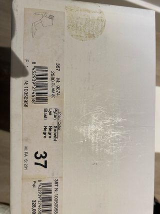 Sandalias de tacon de piel de serpiente de Farrutx