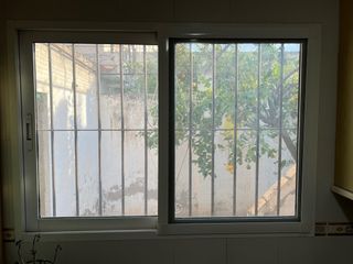 Juego ventanas y puerta alumino climalit .