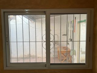 Juego ventanas y puerta alumino climalit .