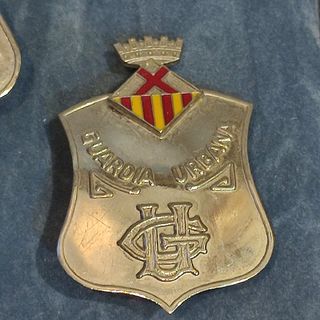 ESTUCHE CON PLACAS DE POLICIA DEL HOSPITALET