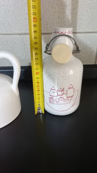 Tris contenitori bottiglie in ceramica