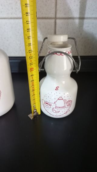 Tris contenitori bottiglie in ceramica