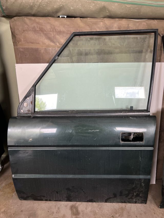 Puerta delantera (lado conductor) discovery 300